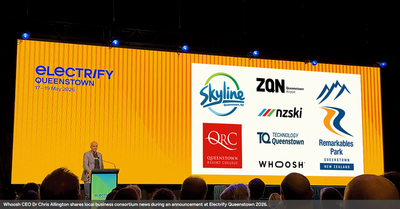 Whoosh CEO Dr Chris Allington shares local business consortium news during an announcement at Electrify Queenstown 2026.